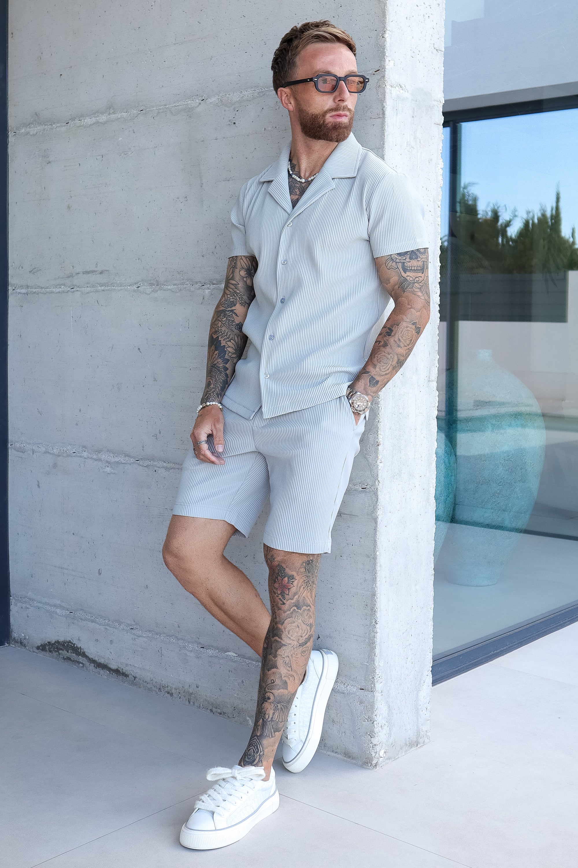 THE ICON. X ROSS CAMPBELL PLEATED SHORTS - GREY