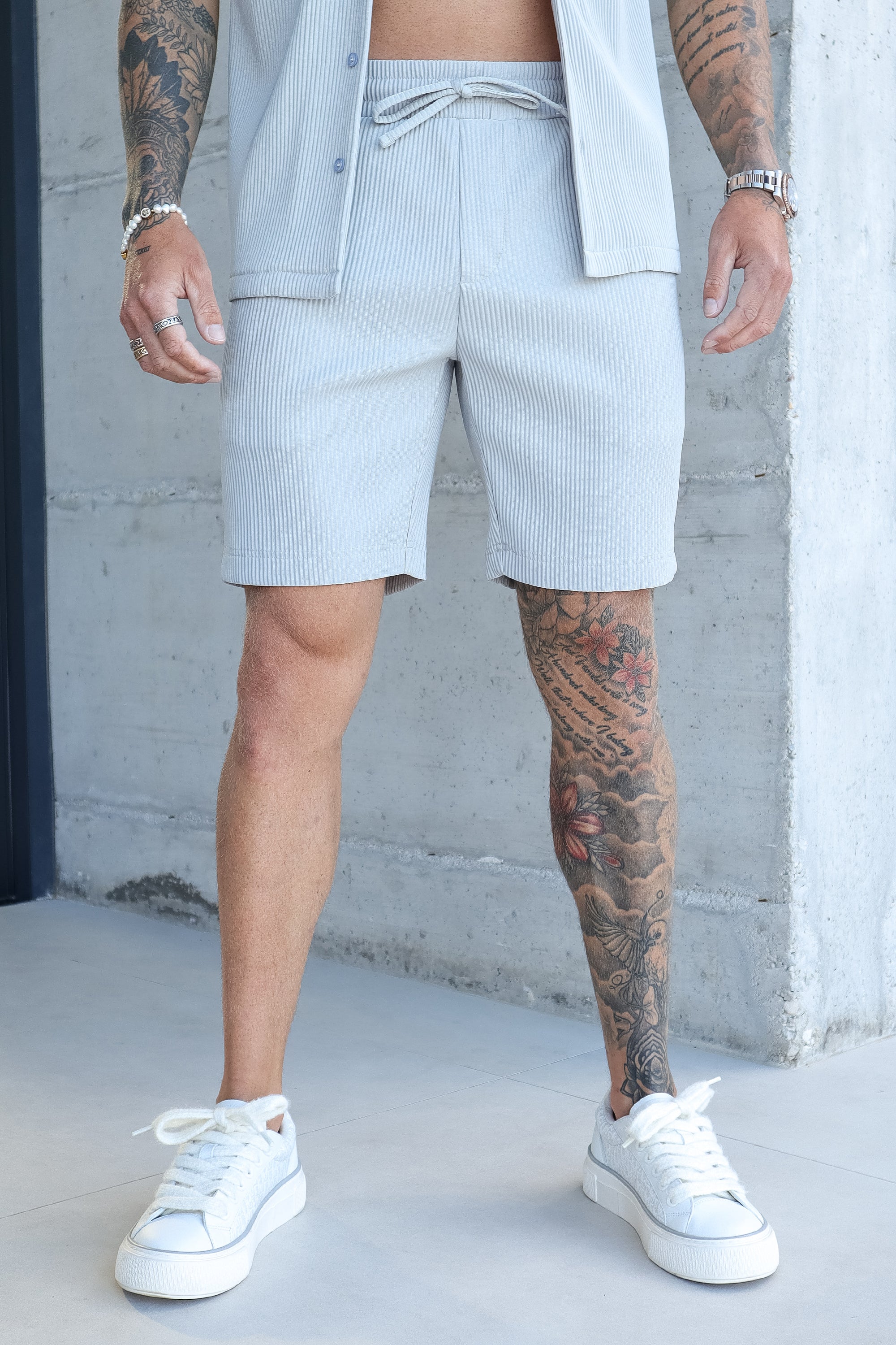 THE ICON. X ROSS CAMPBELL PLEATED SHORTS - GREY