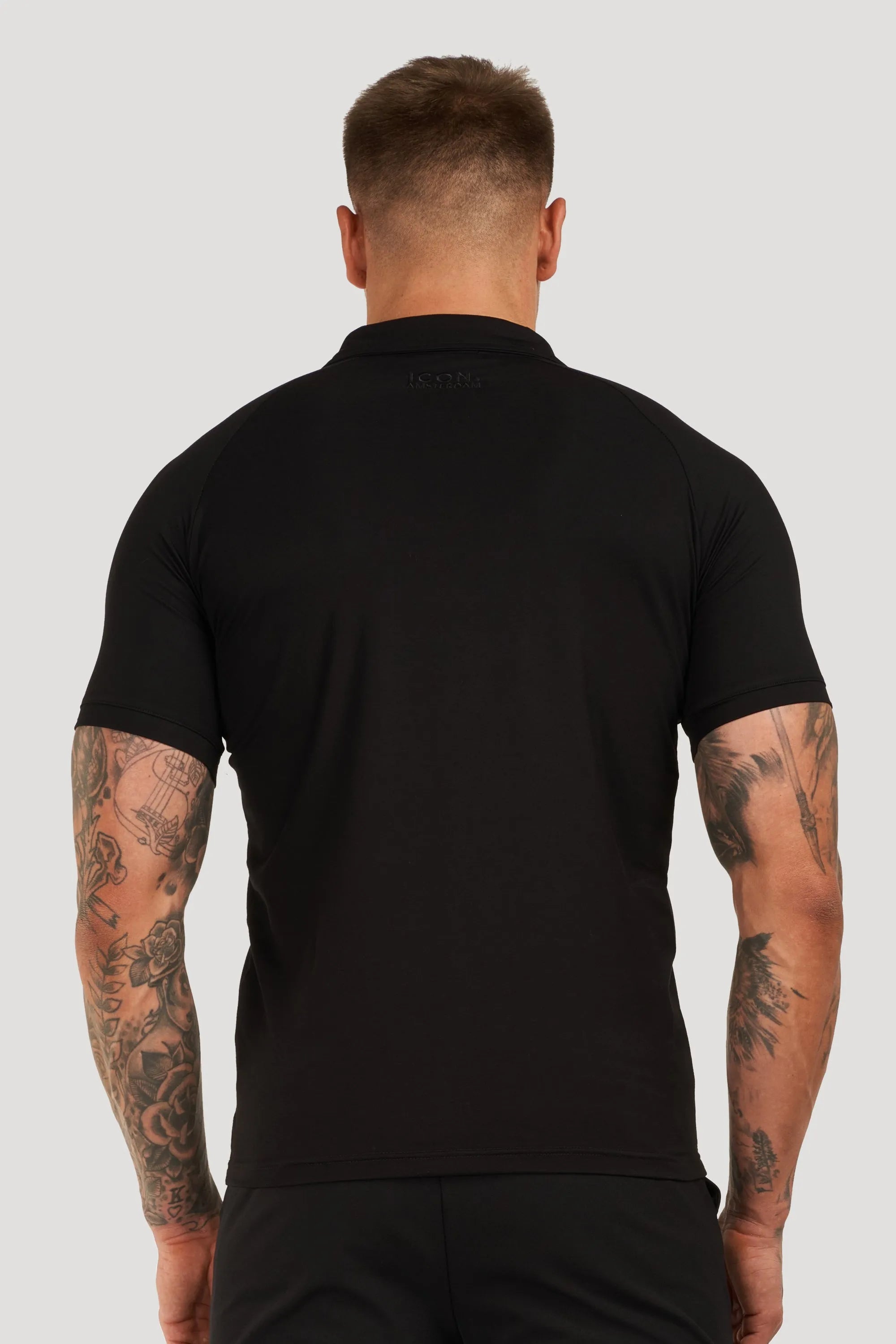 THE MUSCLE BUTTON POLO - BLACK - ICON. AMSTERDAM